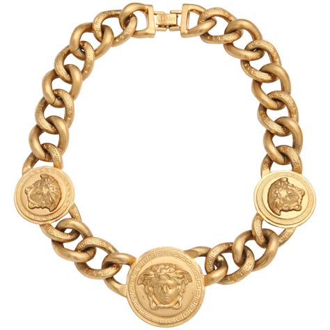 versace gold and diamond pendant|Versace gold chain and pendant.